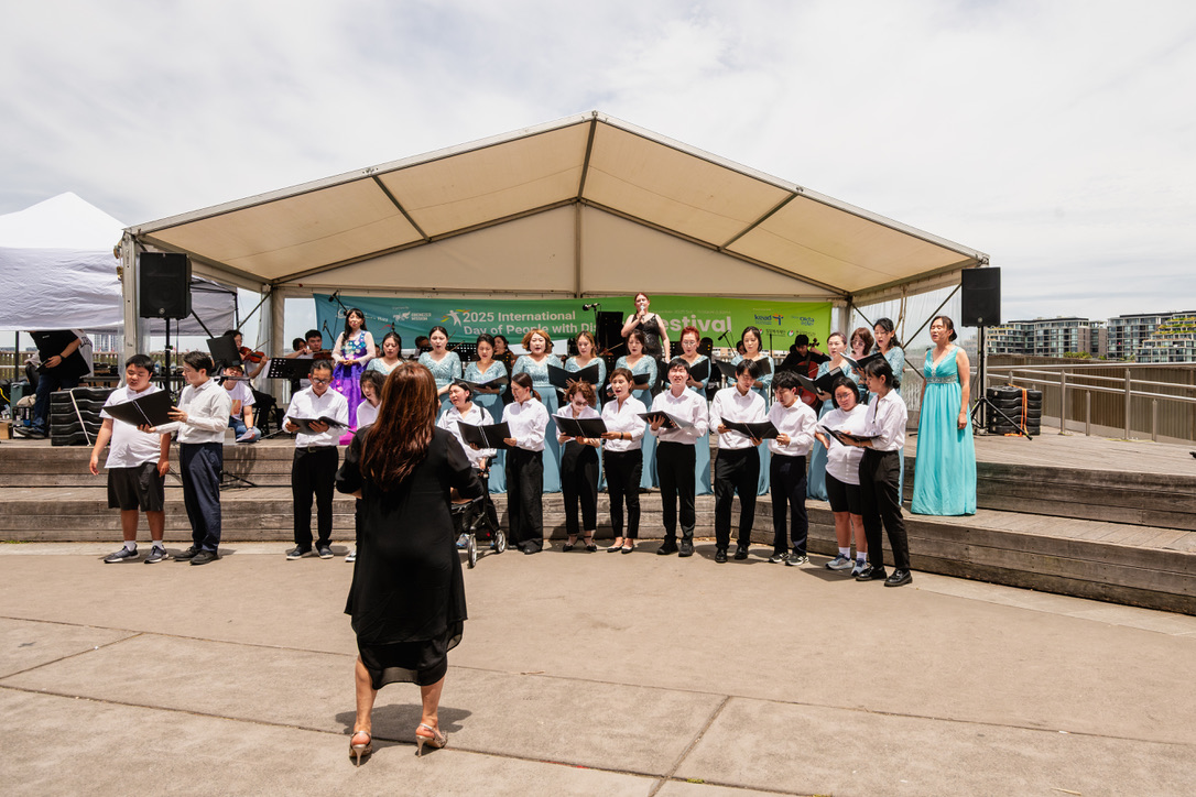 Eben Inclusive Community Choir performing at an IDPwD community festival
