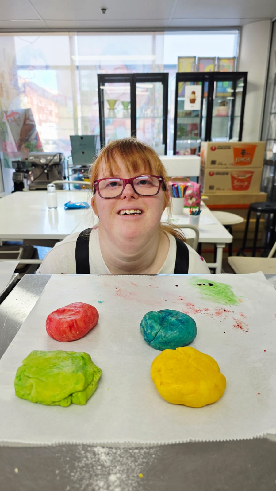 Hannah creating and learning at Eben Coffee House