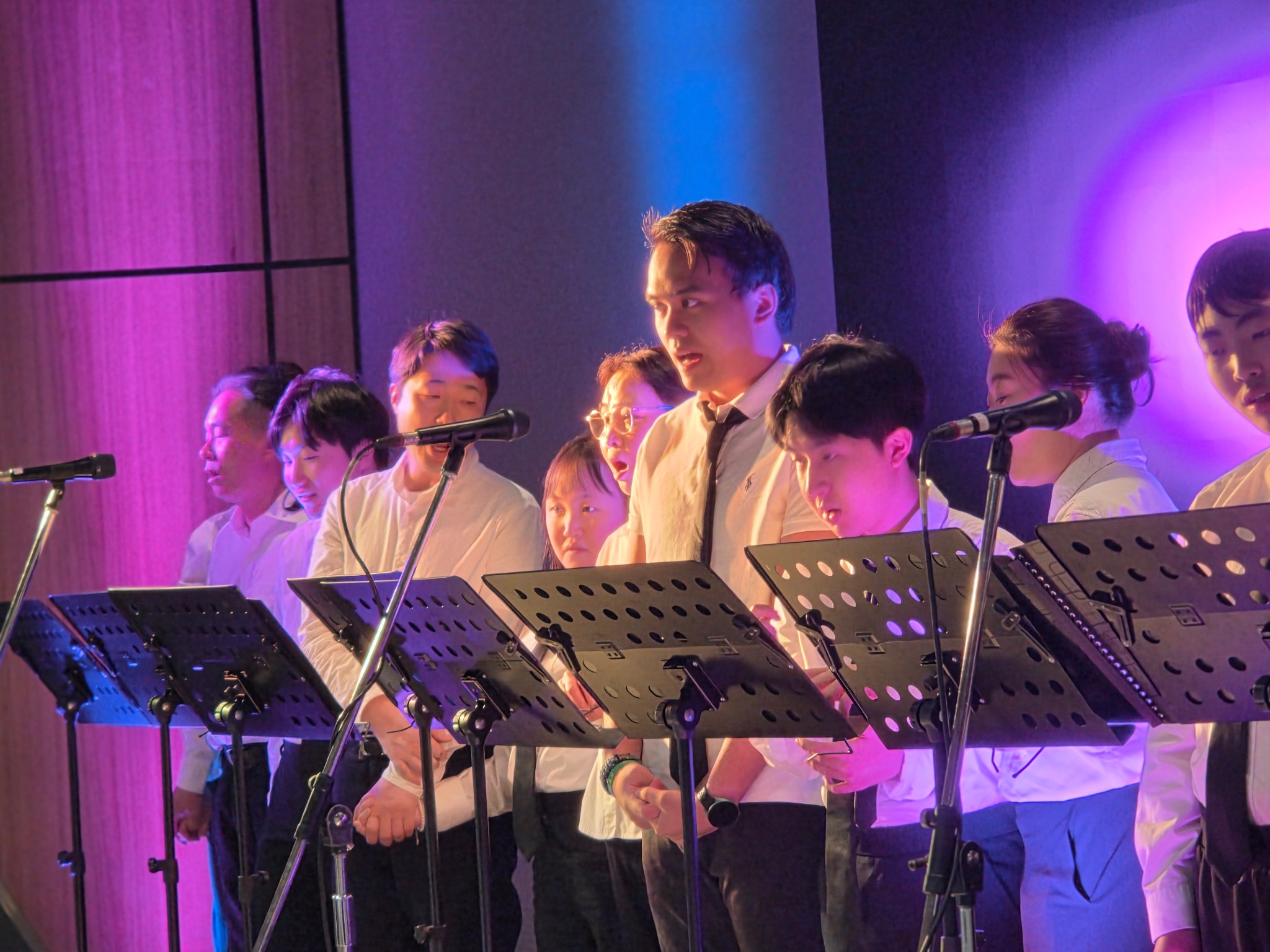 Eben Inclusive Community Choir performing at an indoor concert